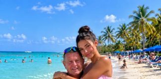Moja majka me oduvijek upozoravala: „Nikada nemoj sjesti djedu u krilo.“ Mislila sam da je smiješna — sve dok mi to jednog dana, na plaži, nakon što smo snimili ovu fotografiju, ponovno nije rekla. Ovaj put sam je napokon upitala zašto… - featured image